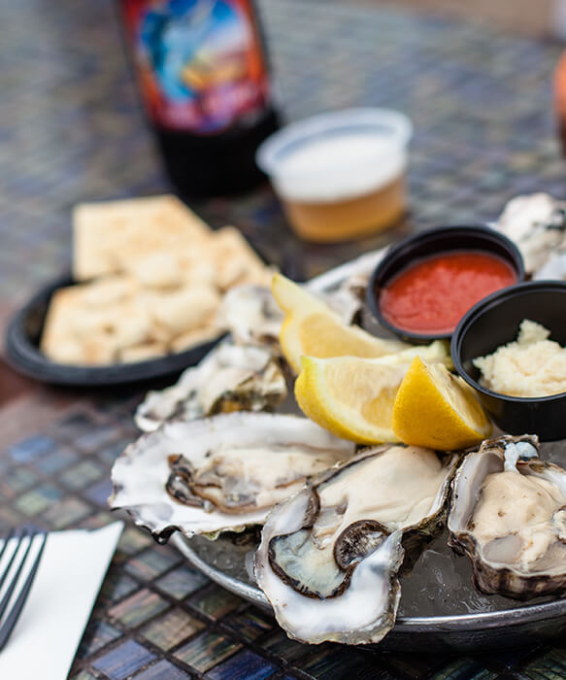 oyster with lemon and sauces