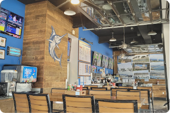 local fish shop inside with chairs and tables